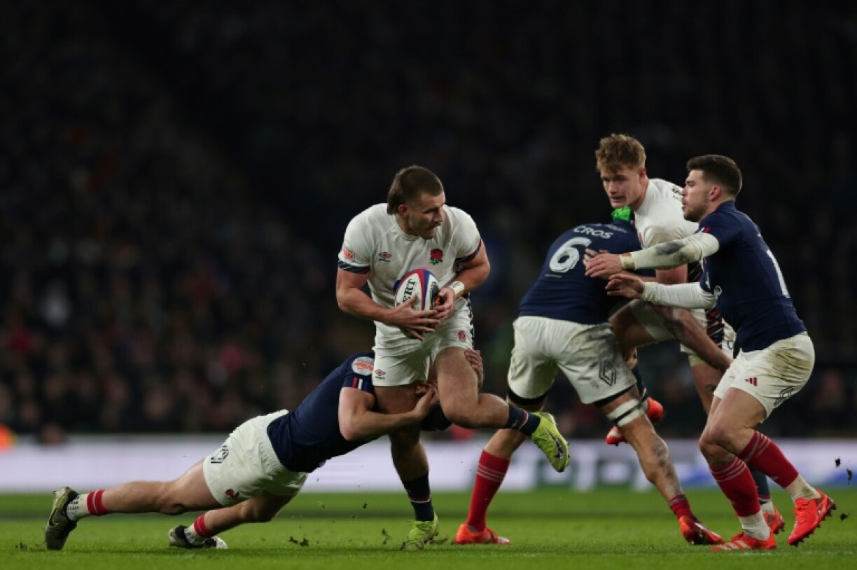 On the attack: England wing Ollie Sleightholme (2L) in action during a dramatic 26-25 Six Nations win over France at Twickenham