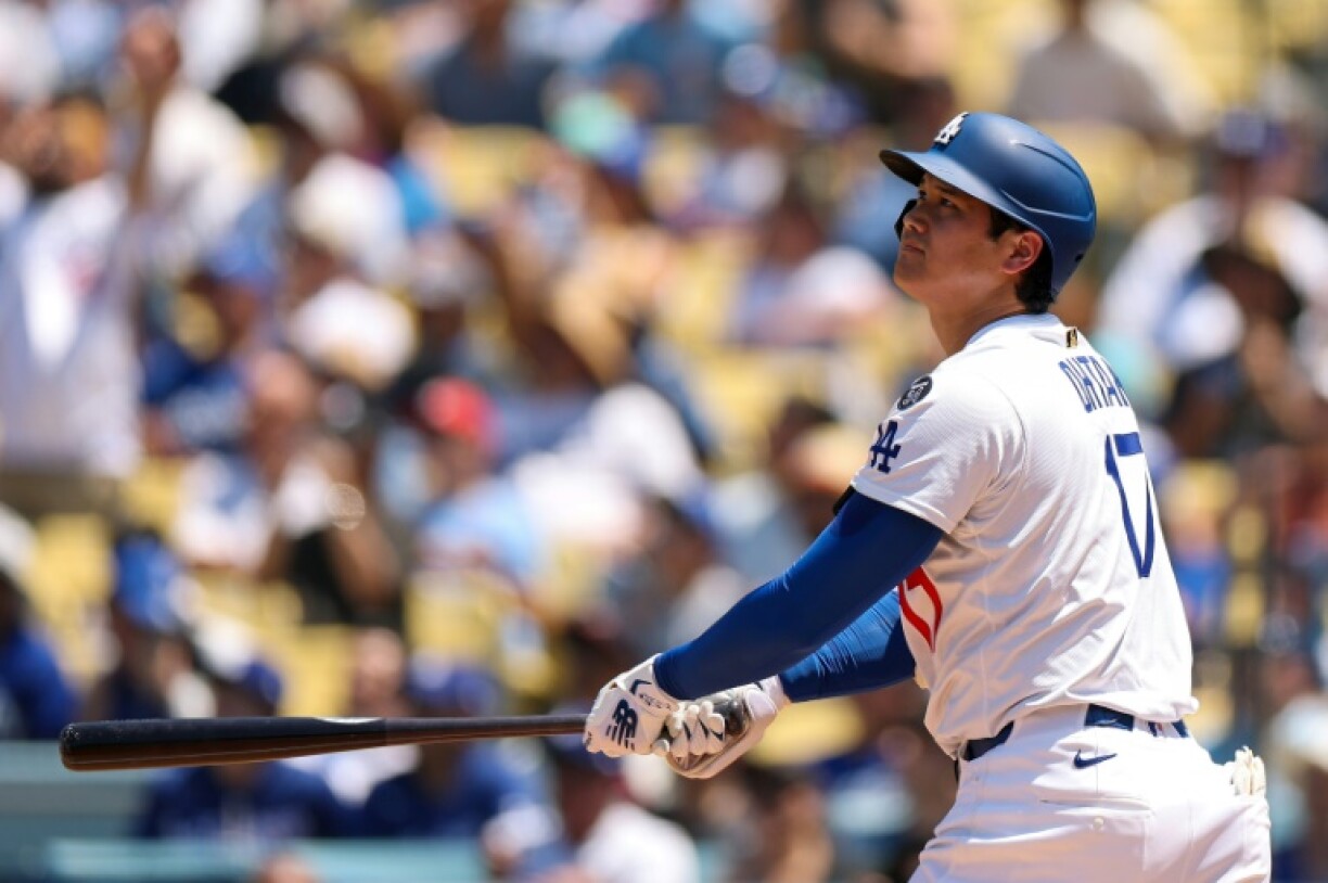 Shohei Ohtani of the Los Angeles Dodgers hits a two-run home run to notch his 1,000th MLB career hit