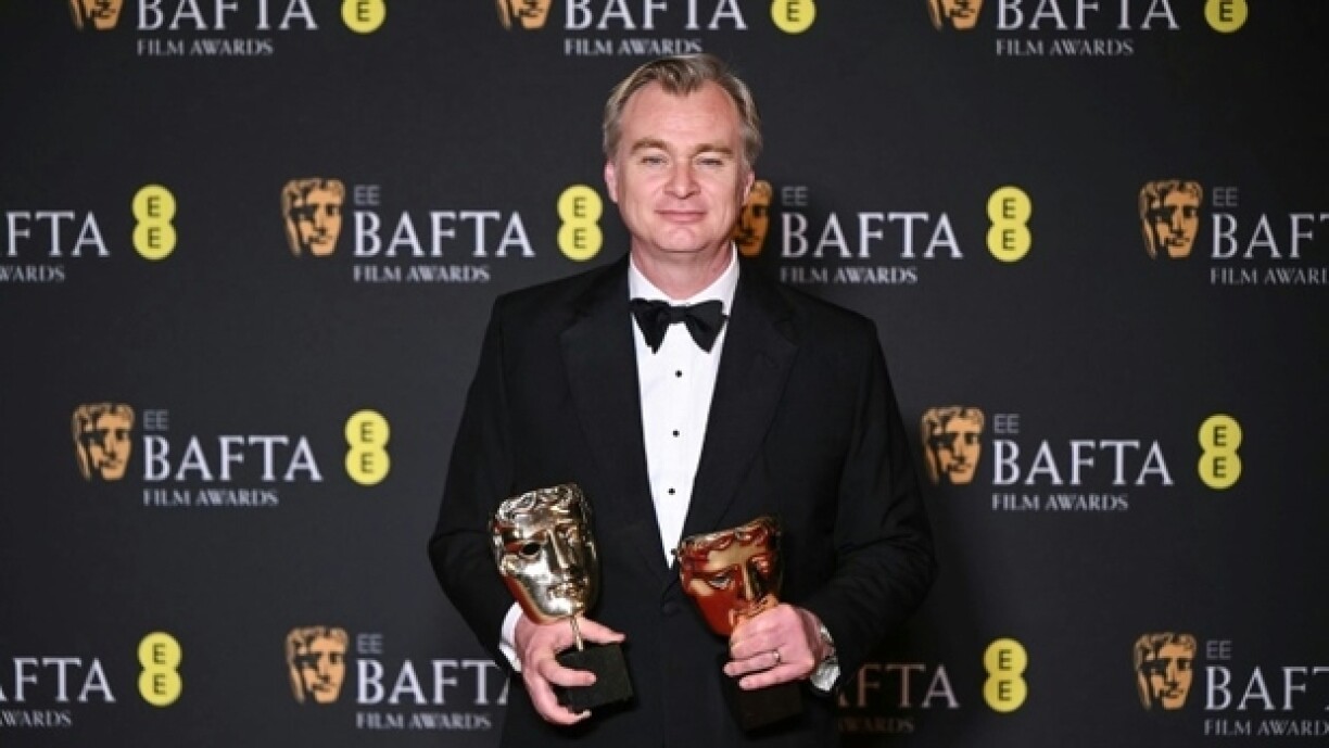 De brittesche Regisseur Christopher Nolan bei de Bafta-Film-Awards. (Bafta steet fir: British Academy of Film and Television Arts)