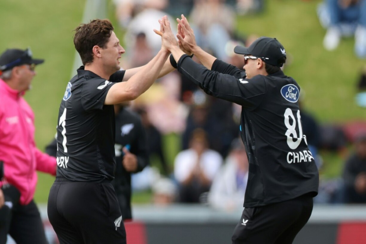 New Zealand's Matt Henry (left) celebrates the wicket of Sri Lanka's Pathum Nissanka with teammate Mark Chapman