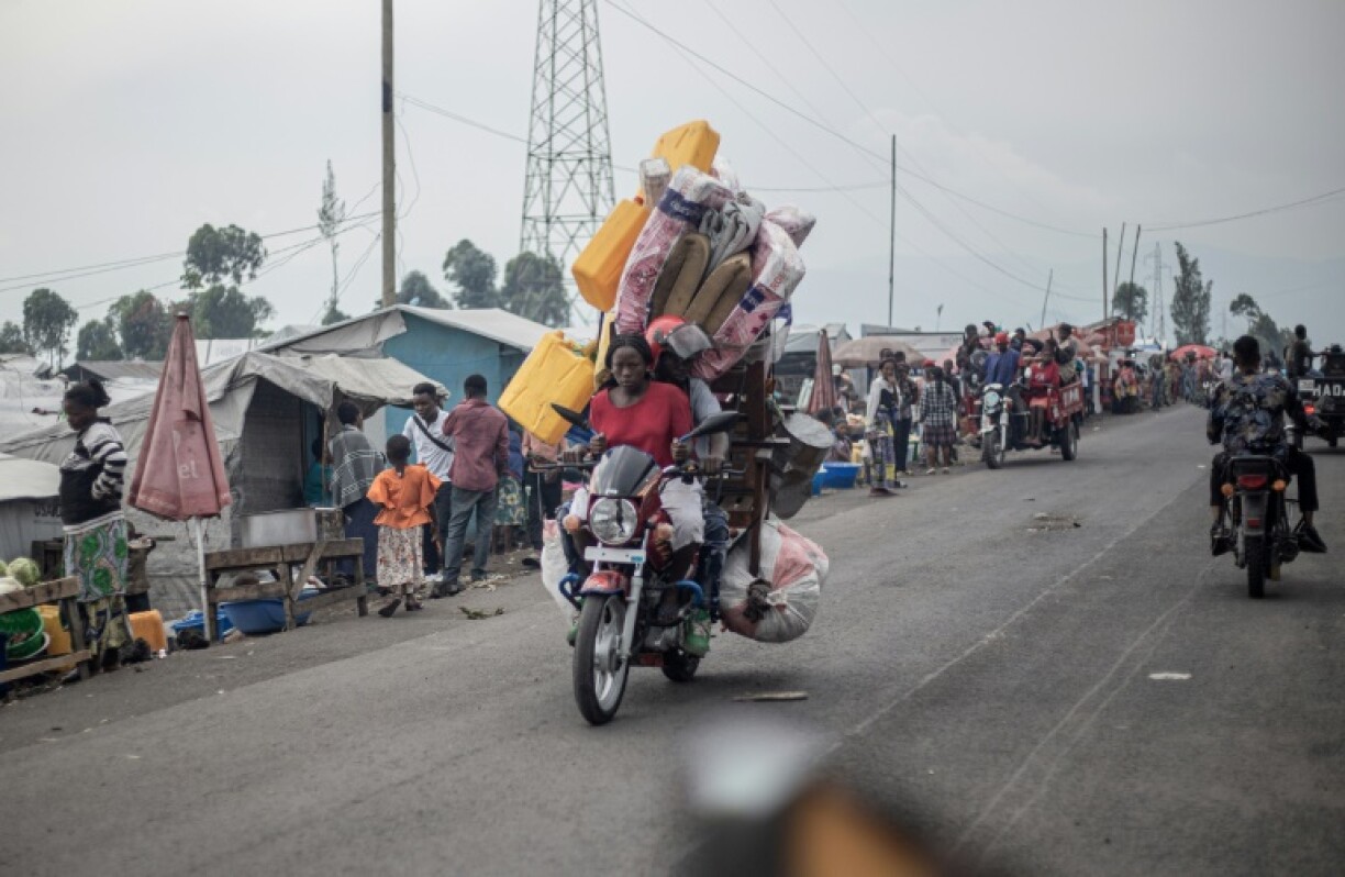 A motorbike loaded up with belongings as people flee advancing fighters