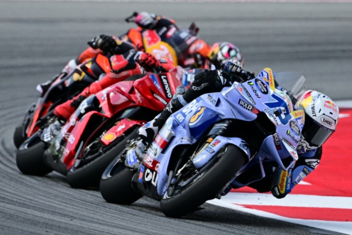 Alex Marquez (R) leads brother Marc Marquez during his Catalunya MotoGP victory on Sunday in Montmelo