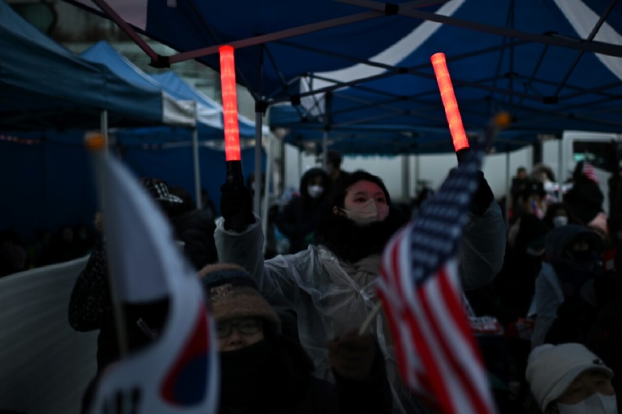 Supporters of impeached South Korea president Yoon Suk Yeol rally near his residence in Seoul