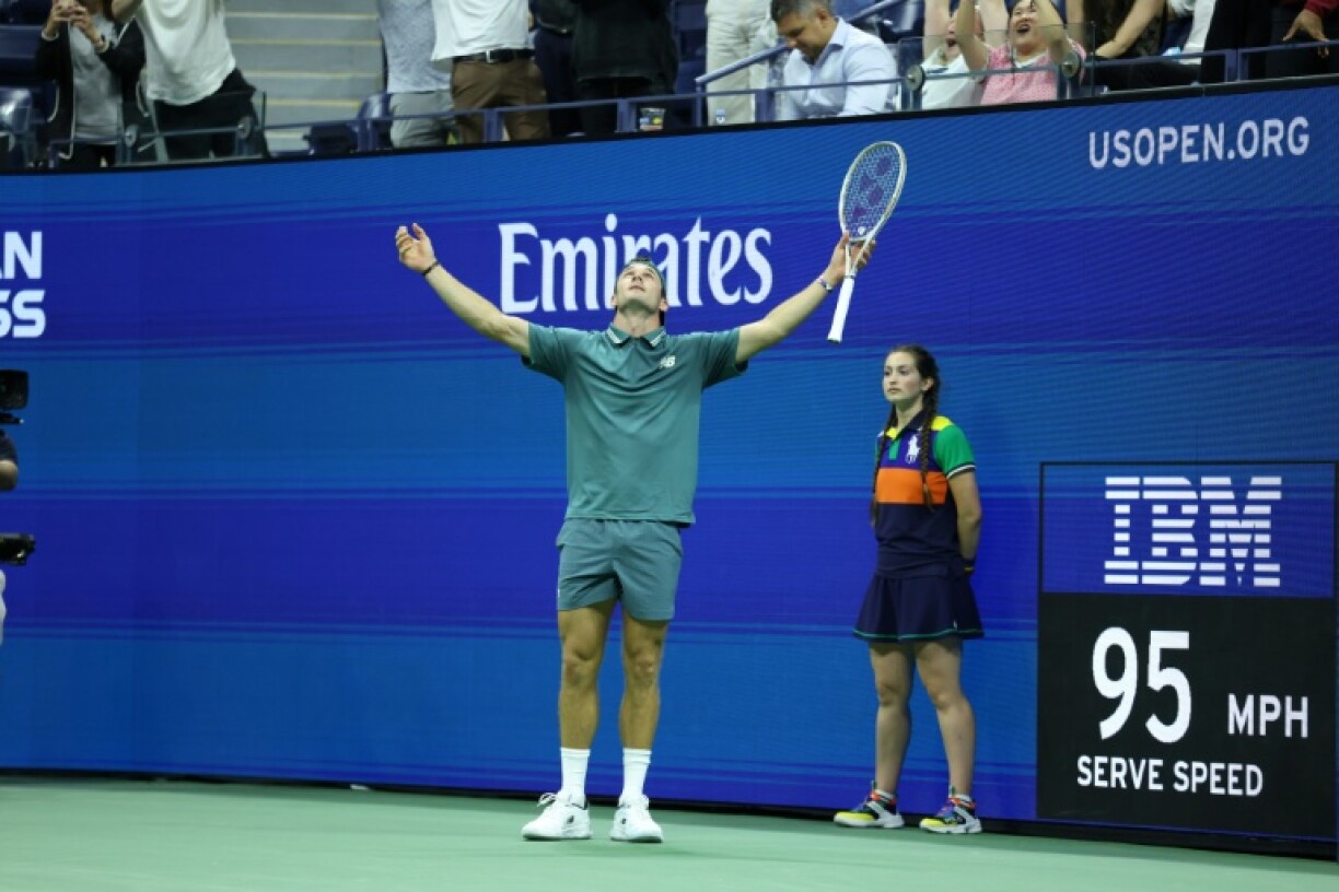 Tommy Paul celebrates after beating Nuno Borges