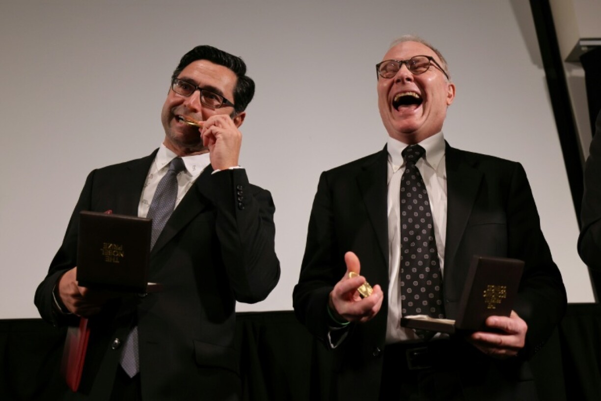 David Card (right) attended school in rural Canada, often listening in to what older classes were learning