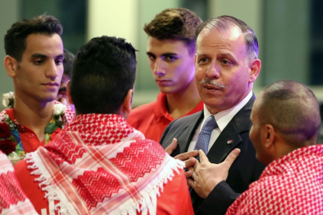 Jordanian Prince Feisal Al-Hussein (2R) is bidding to become the first president of the IOC from Asia