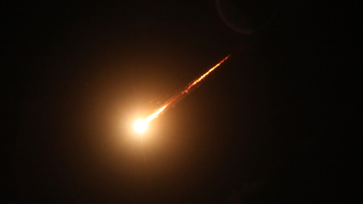 A ballistic missile fired toward Israel as seen from Hebron, West Bank, on 15 June 2025.