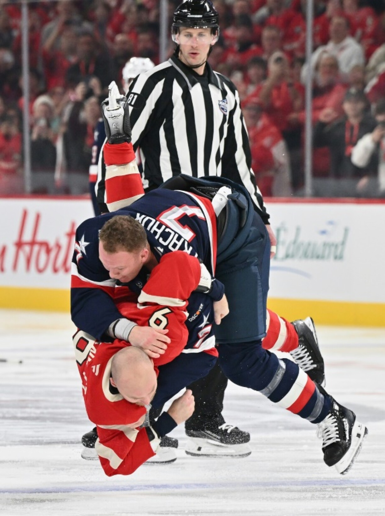 Team USA's Brady Tkachuk, top front, fights with Canada's Sam Bennett in the first period of a 3-1 US victory in what proved to be a preview of Thursday's Four Nations Face-Off final Thursday at Boston