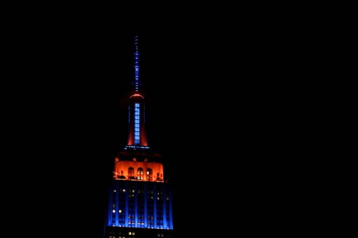 The Empire State building lit up in the colours of the New York Knicks after they reached the NBA Eastern Conference Final