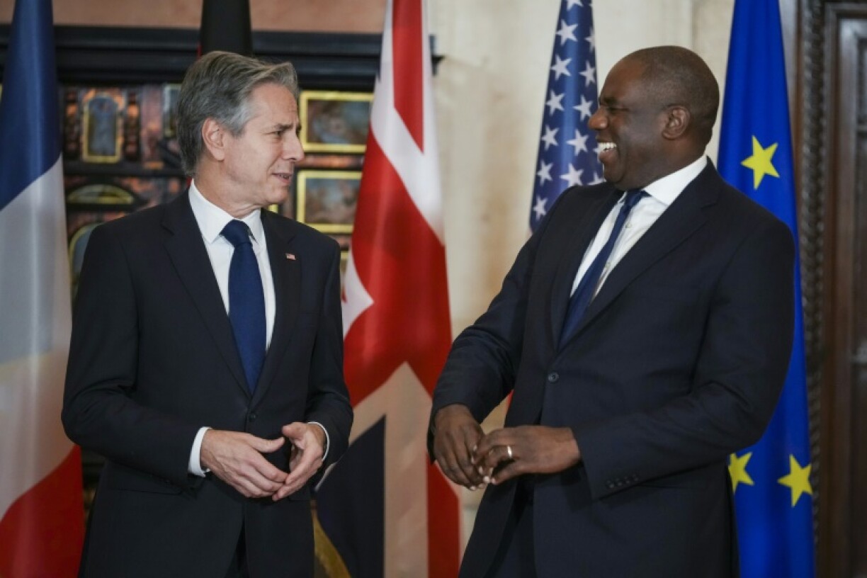 US Secretary of State Antony Blinken talks to Britain's Foreign Secretary David Lammy ahead of a meeting at Villa Madama in Rome on Syria