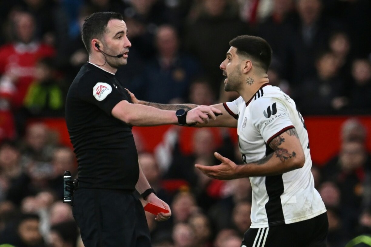 Aleksandar Mitrovic (right) was sent-off for pushing the referee in Fulham's 2023 quarter-final defeat at Man Utd