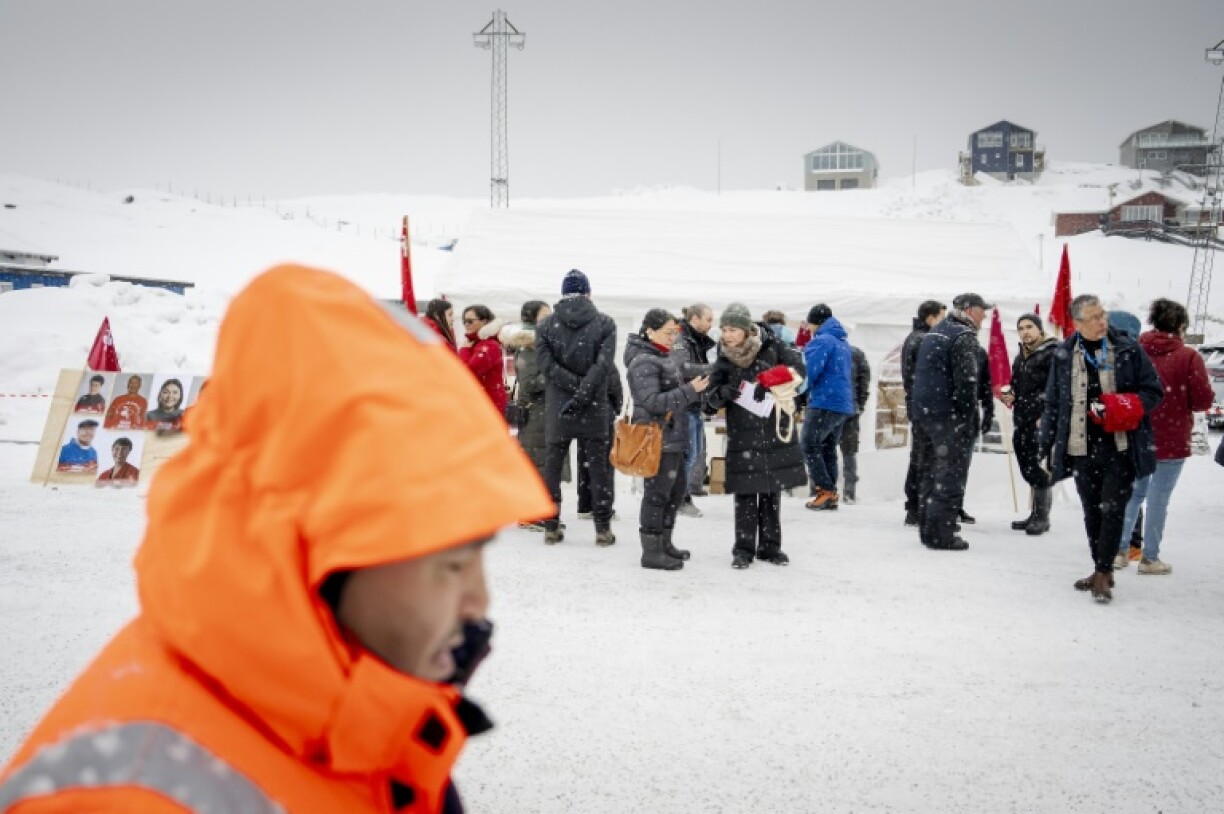 Voters at a polling station in Greenland, where left-wing party Siumut have pulled ahead in municipal elections