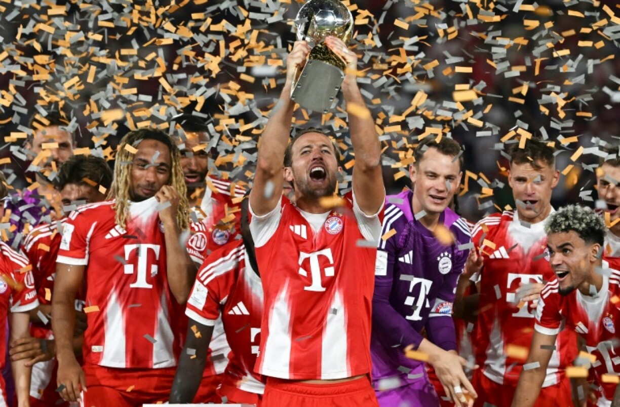 Bayern Munich striker Harry Kane lifts the Franz Beckenbauer Super Cup. The trophy was the second team honour in Kane's career, after the 2024-25 Bundesliga.