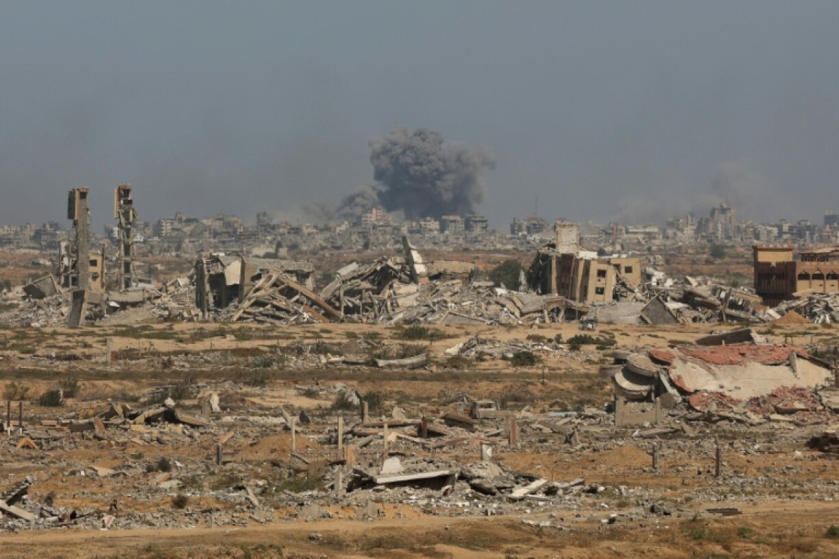 Smoke billows following an Israeli strike in Gaza City, on October 2, 2025, as pictured from Nuseirat in central Gaza