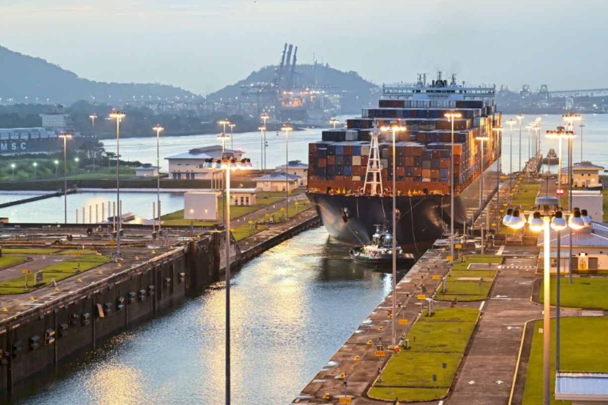 A cargo ship transits through Panama Canal