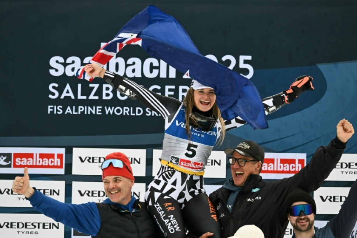 Alice Robinson celebrates with team members