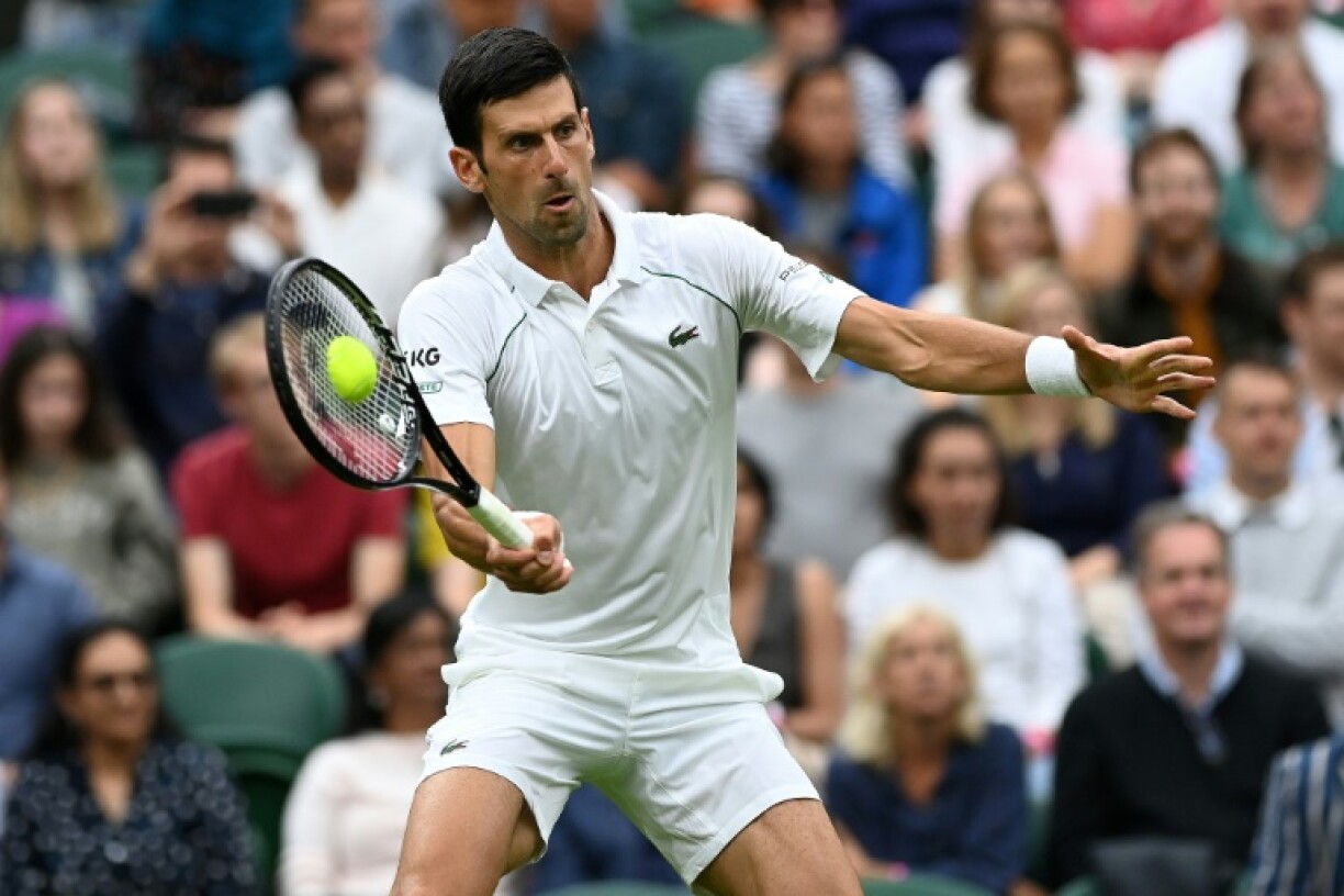 Le Serbe Novak Djokovic, lors de son match du 1er tour contre le Britannique Jack Draper, le 28 juin 2021 au tournoi de Wimbledon à Londres