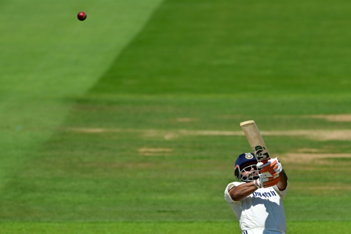 India's Rishabh Pant hits a six off England captain Ben Stokes to complete his fifty in the third Test at Lord's