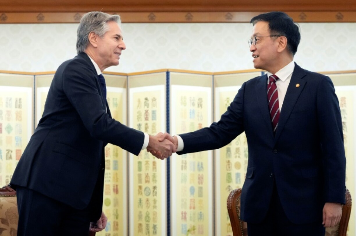 South Korea's acting president Choi Sang-mok shakes hands with US Secretary of State Antony Blinken during a meeting in Seoul