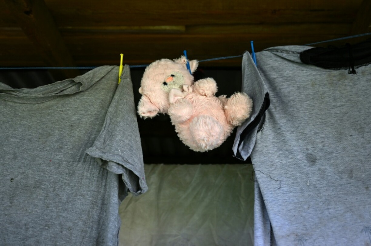 This photo taken on October 9, 2026 shows a soft toy hanging on a clothes line in Rukurukulevu village. The settlement of about 400 people finally electrified its last building this year -- a kindergarten, just metres from the sea.