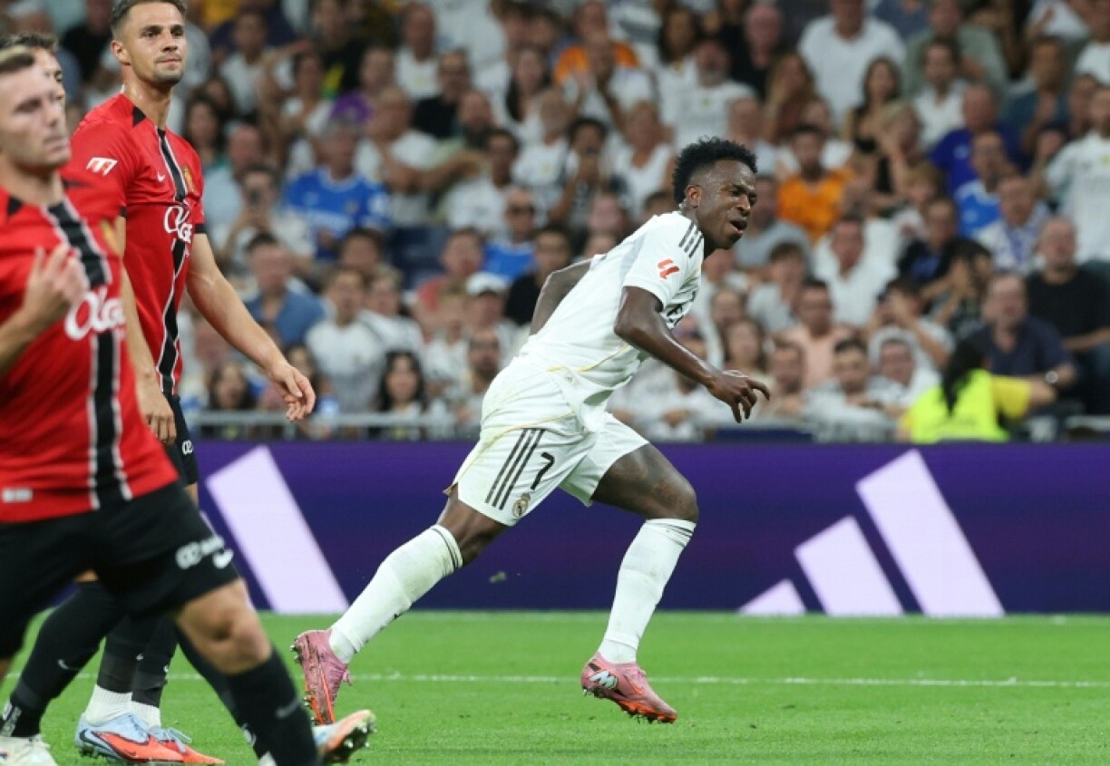 Real Madrid's Brazilian forward Vinicius Junior celebrates scoring his team's second goal during the win over Mallorca
