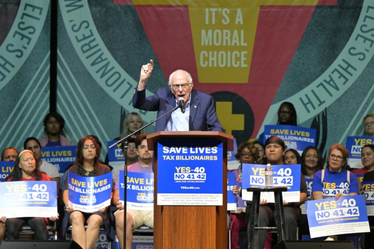 Left-wing Senator Bernie Sanders urged voters at a rally in Los Angeles to support the measure