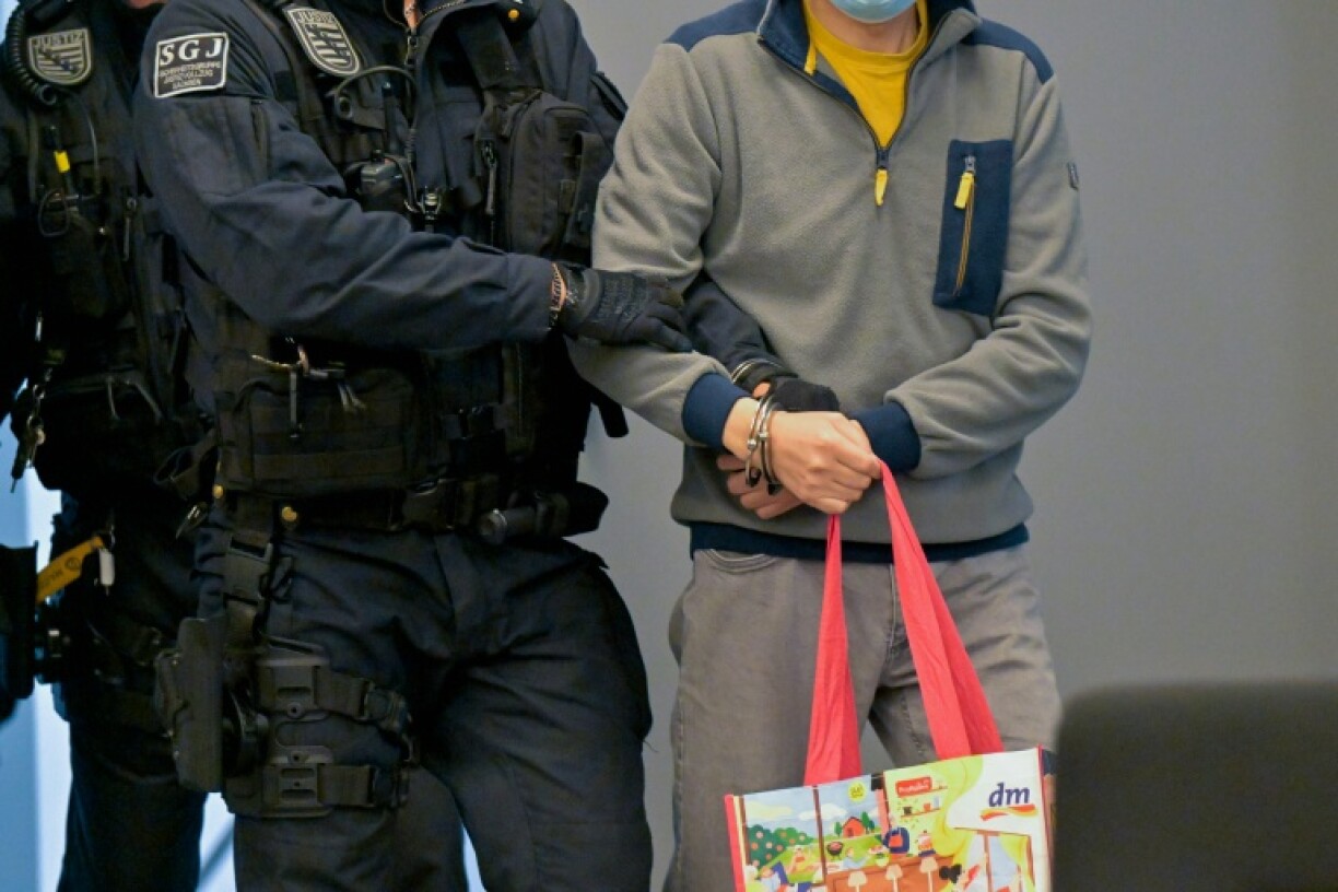 Defendant Jian G., a former assistant to then-member of the European Parliament Maximilian Krah of the far-right Alternative for Germany party, arrives at his espionage trial in a court in Dresden, eastern Germany