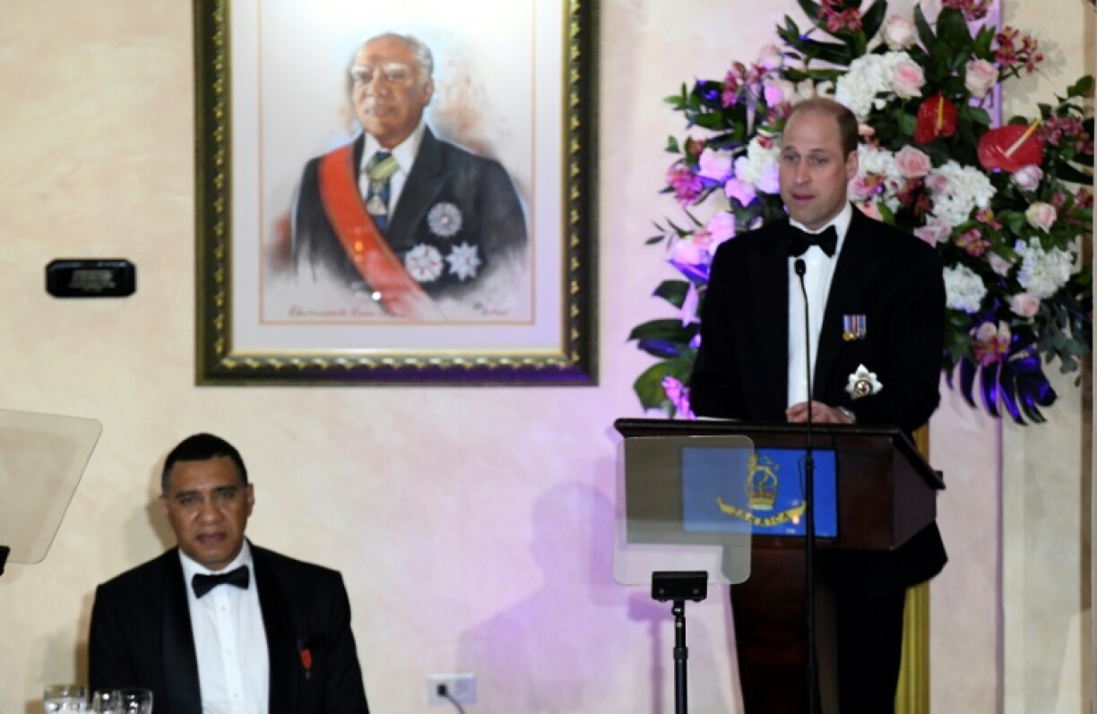 Britain's Prince William (R) expressed 'sorrow' for his country's role in the slave trade at a state dinner in Jamaica on Wednesday evening