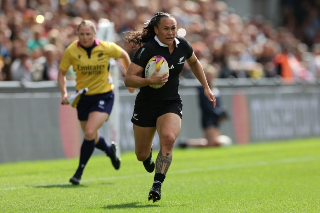 New Zealand's Portia Woodman-Wickliffe runs in her 50th Test try during the champions' 62-19 Women's Rugby World Cup Pool C win over Japan in Exeter