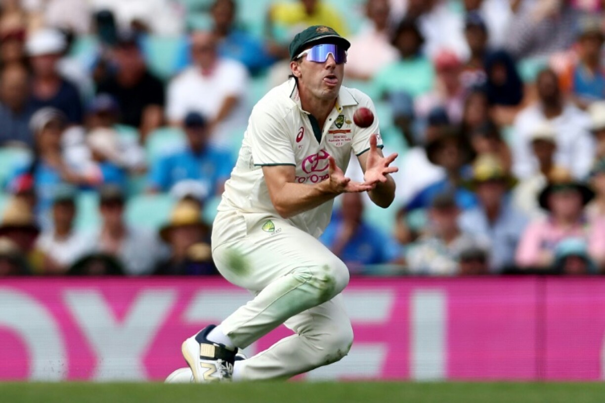 Pat Cummins takes a catch in the recent Test series against India