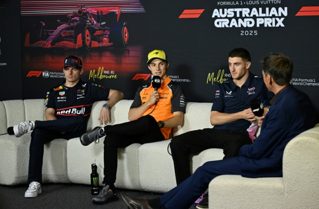 Oscar Piastri (C) says it was a 'no-brainer' to sign a new long-term deal with McLaren