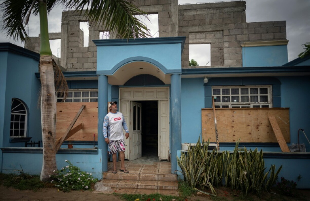 Juan Manuel Sarabia boarded up his house in Puerto San Carlos on Mexico's Baja California peninsula ahead of the arrival of Hurricane Polo