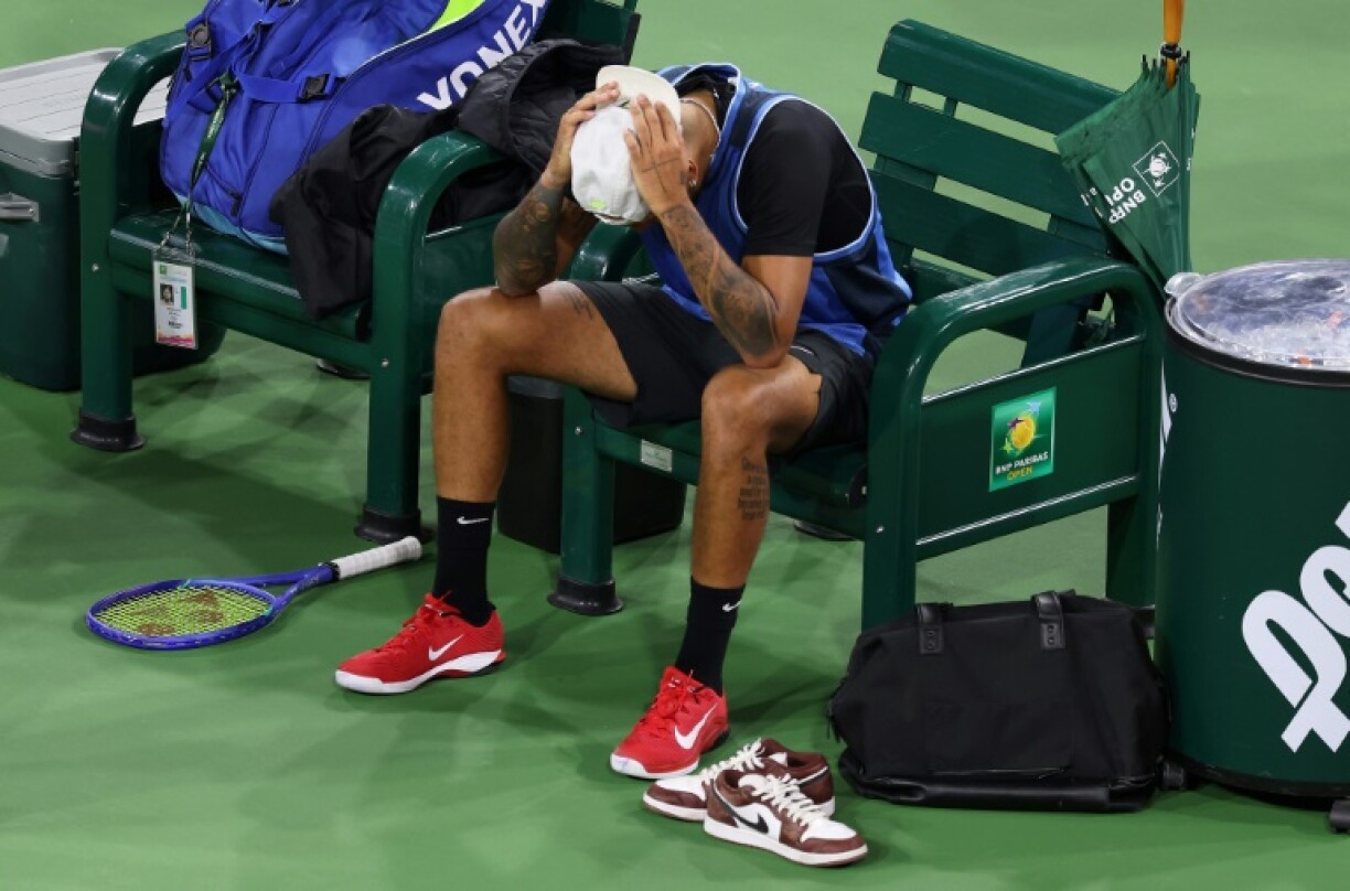 Australian Nick Kyrgios shows his dejection after retiring from his first-round match at Indian Wells with a right wrist injury