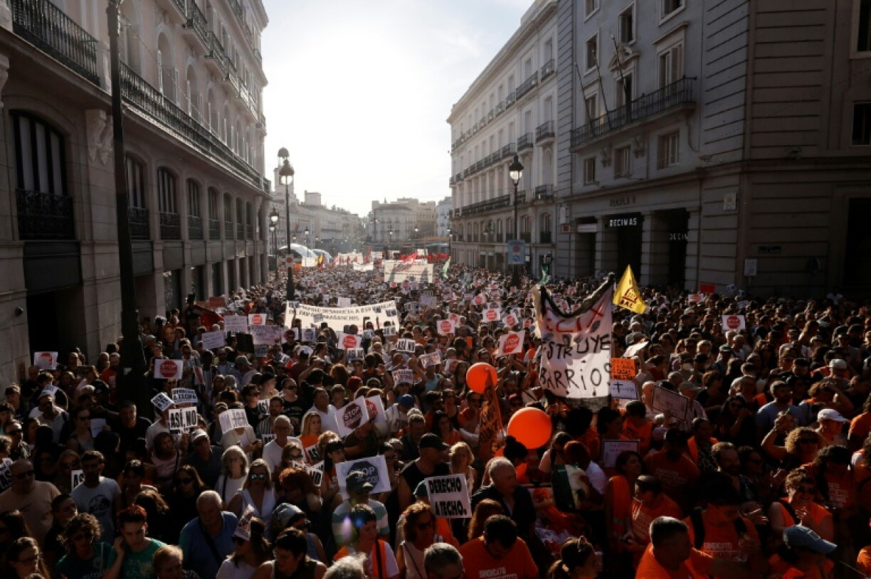 Protesters chanted slogans and held banners calling for measures to make evictions more difficult