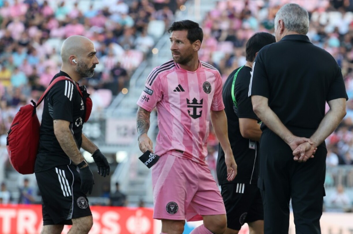 Argentine star Lionel Messi of Inter Miami, shown leaving a Leagues Cup match in the 11th minute with an injury, is out indefinitely with a minor right leg muscle injury, the MLS club said