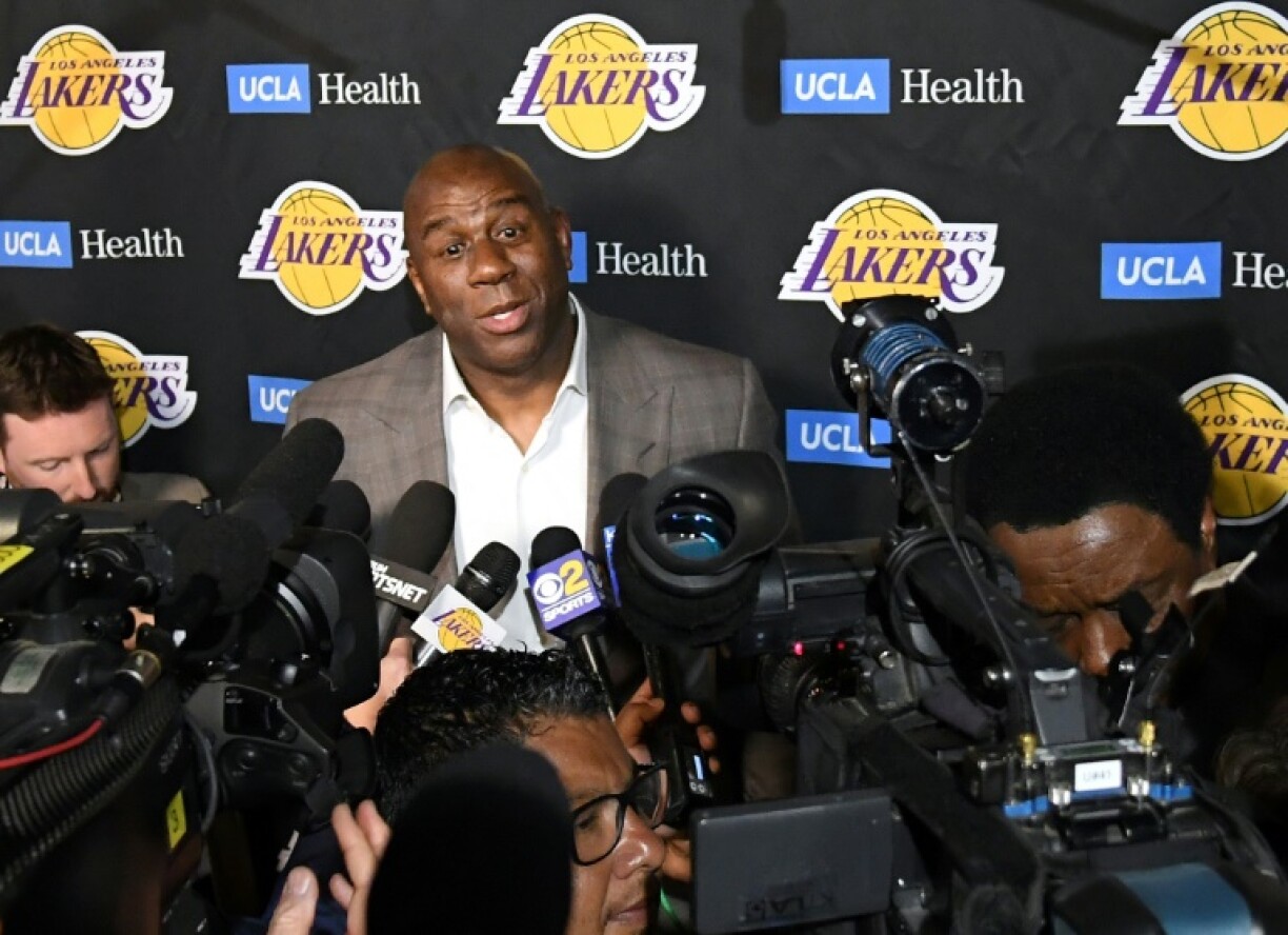 Lakers legend Magic Johnson says the blockbuster sale of the NBA franchise should be a cause for celebration by fans