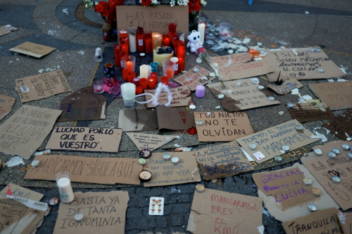 An improvised shrine was set up in Madrid's Puerta del Sol square, the epicentre of the housing protests