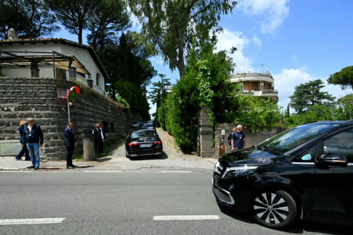 Members of Iran's delegation arrive at the Omani embassy in Rome for the talks