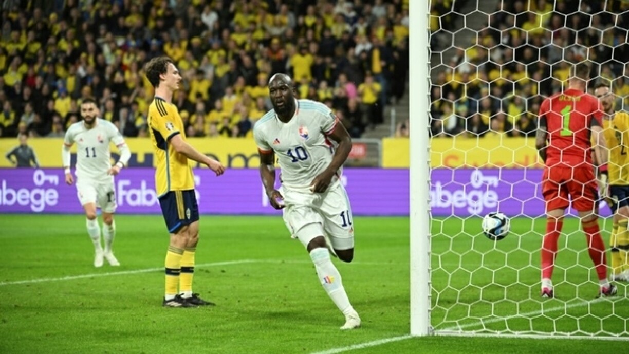 Le buteur Romelu Lukaku vient d'ouvrir le score pour la Belgique contre la Suède à Solna, près de Stockholm, le 24 mars 2023