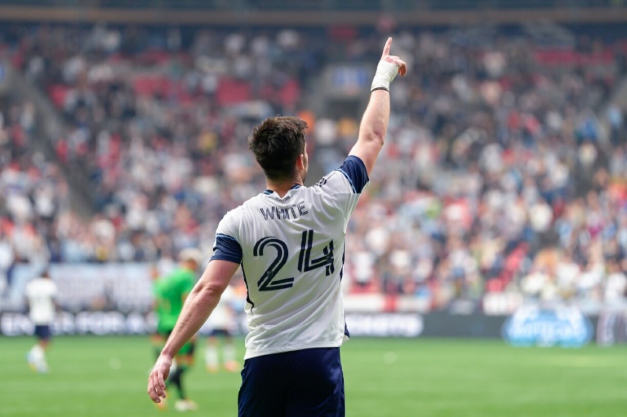Brian White scored both goals as the Vancouver Whitecaps fought back for a 2-2 draw with LAFC in MLS on Sunday.