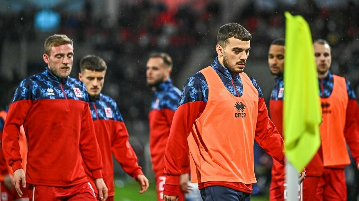 D'Lëtzebuerger Nationalekipp virun der Partie géint Portugal.