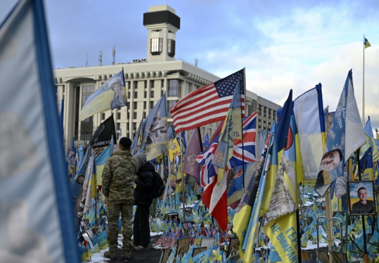 American flags stand at the makeshift memorial to Ukrainian servicemen in Kyiv