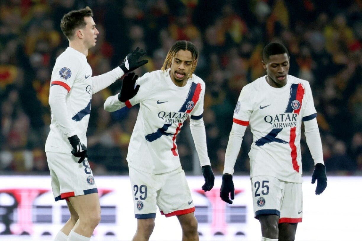 Fabian Ruiz (L) and Bradley Barcola (C) got Paris Saint-Germain's goals in their 2-1 win at Lens on Saturday
