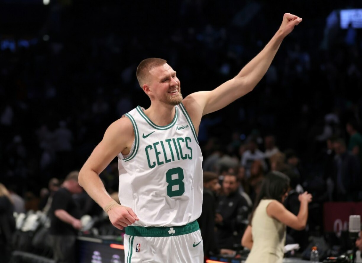 Latvian center Kristaps Porzingis celebrates an NBA victory by the Boston Celtics at Brooklyn
