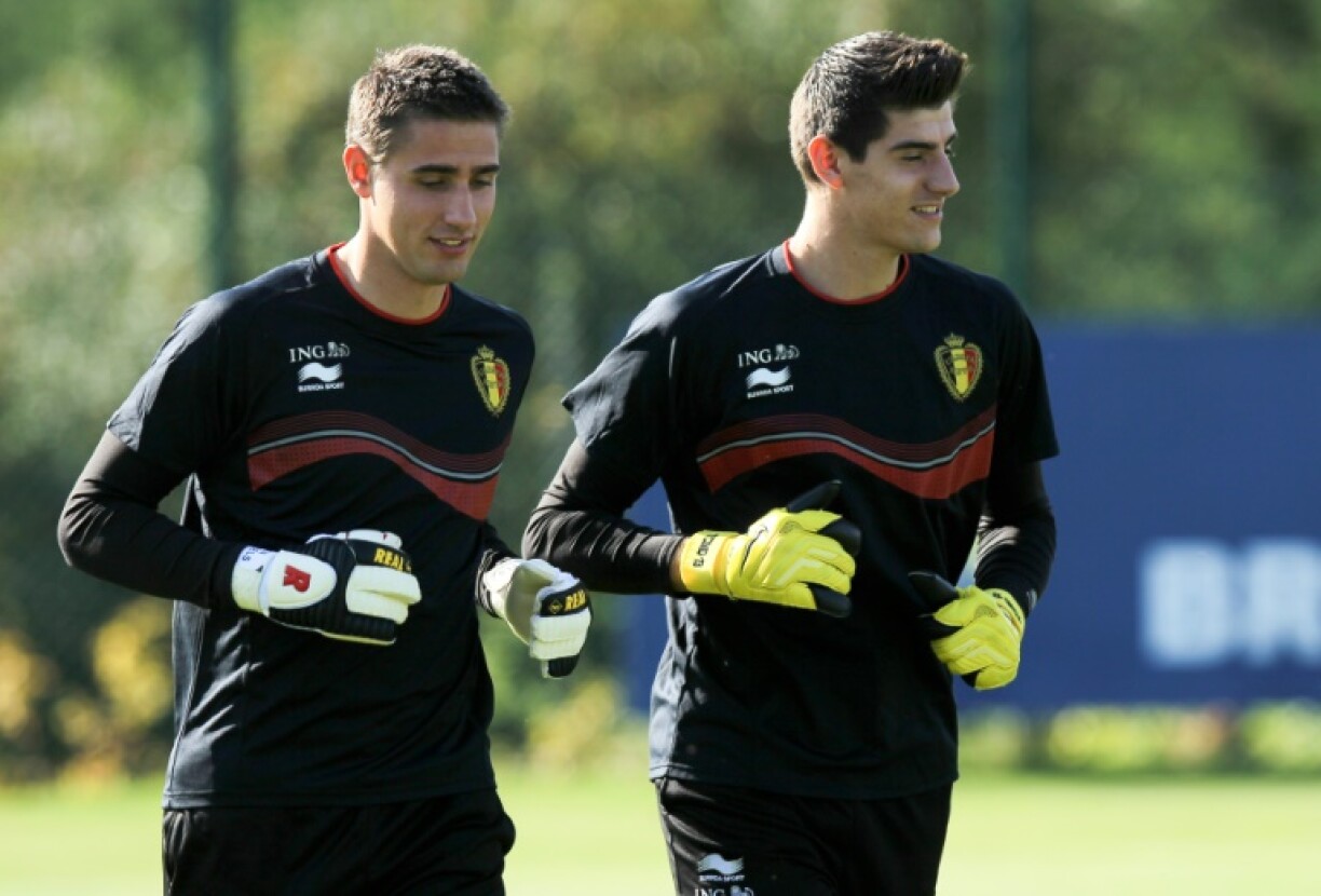 Koen Casteels (L) has retired from international football following the likely return to the Belgium national team set-up of Thibaut Courtois (R)