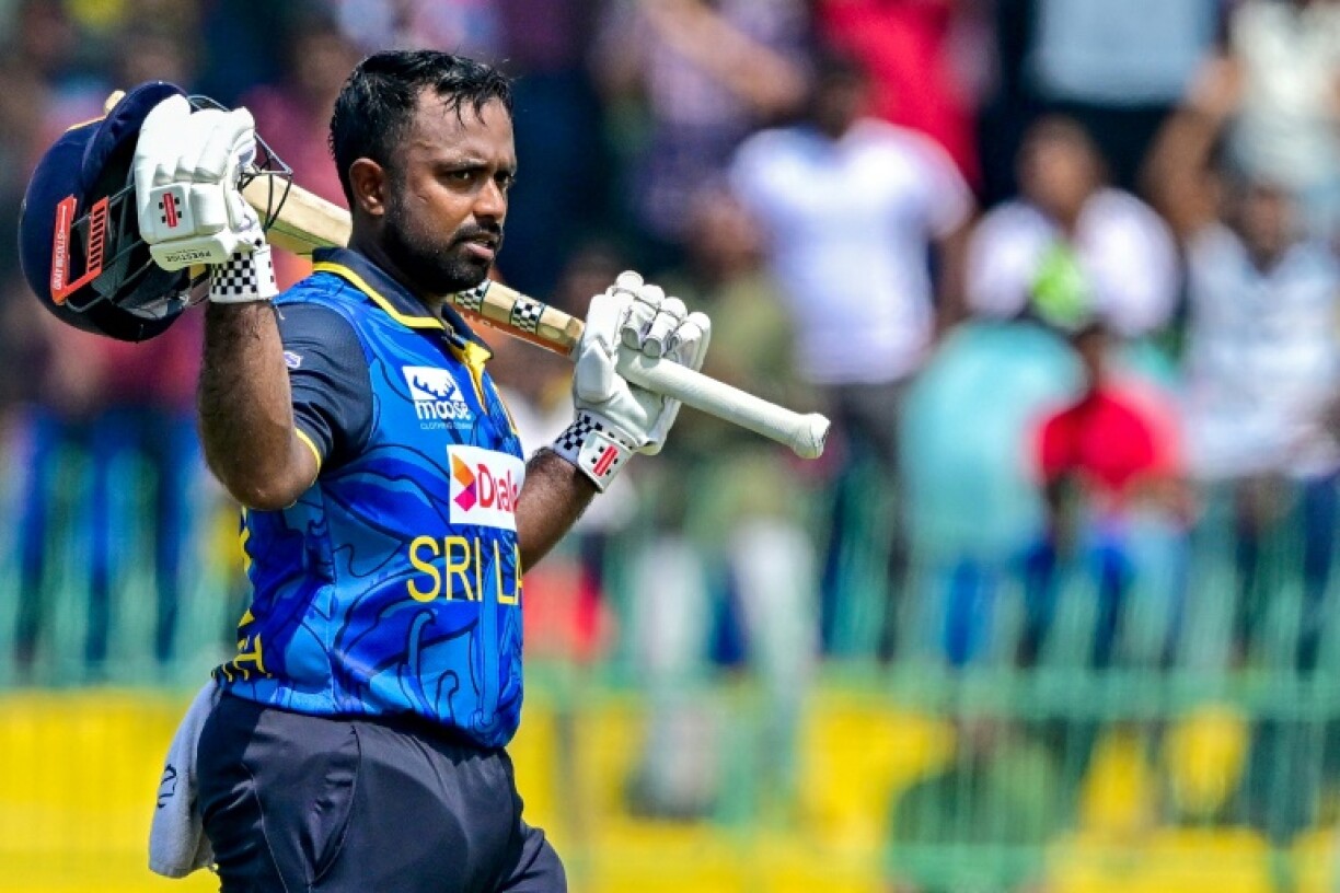 Sri Lanka's captain Charith Asalanka celebrates after scoring a century