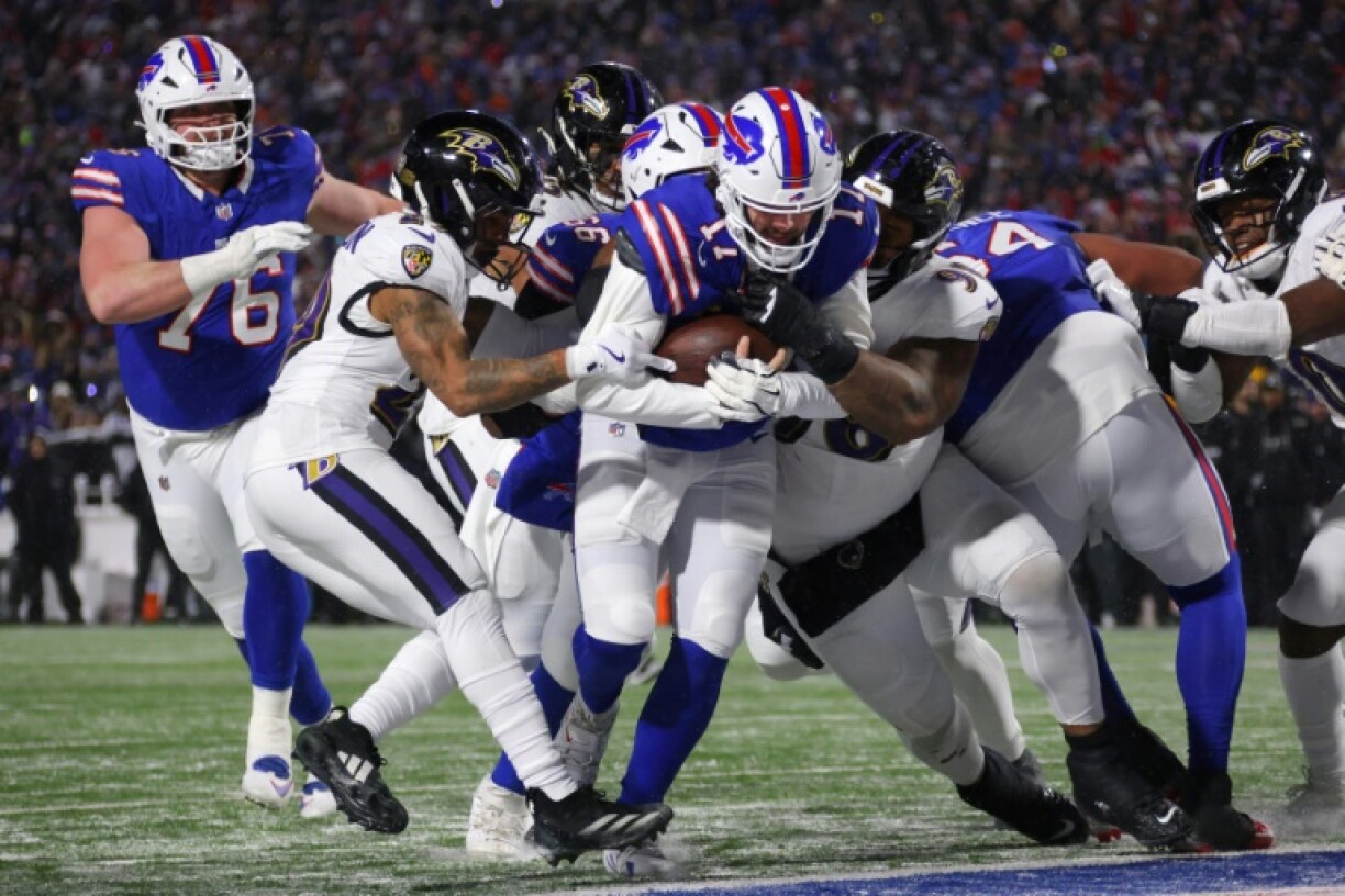 Josh Allen barges over for one of his two touchdowns in the Buffalo Bills playoff victory over the Baltimore Ravens