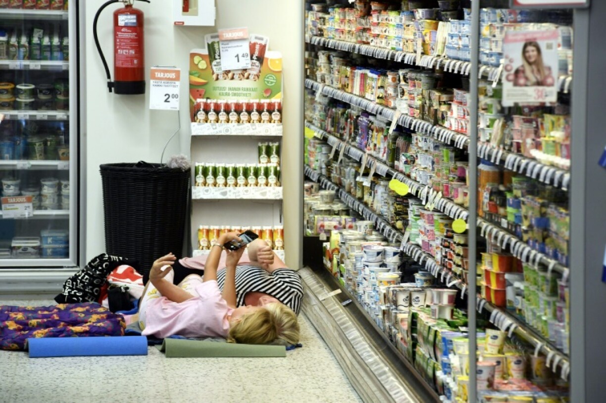 People in Finland slept next to the cooling shelves in a grocery store to escape the heatwave