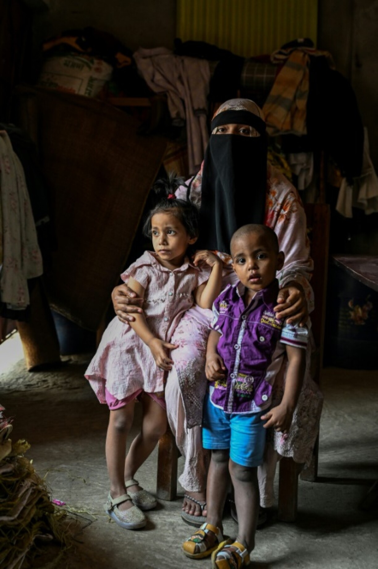 Widowed: Rekha Akter and her children. Her husband was a safety supervisor at a Chittagong yard