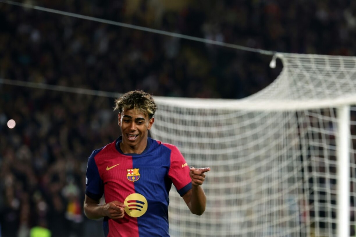 Barcelona forward Lamine Yamal after scoring his side's fourth goal against Borussia Dortmund in the first leg